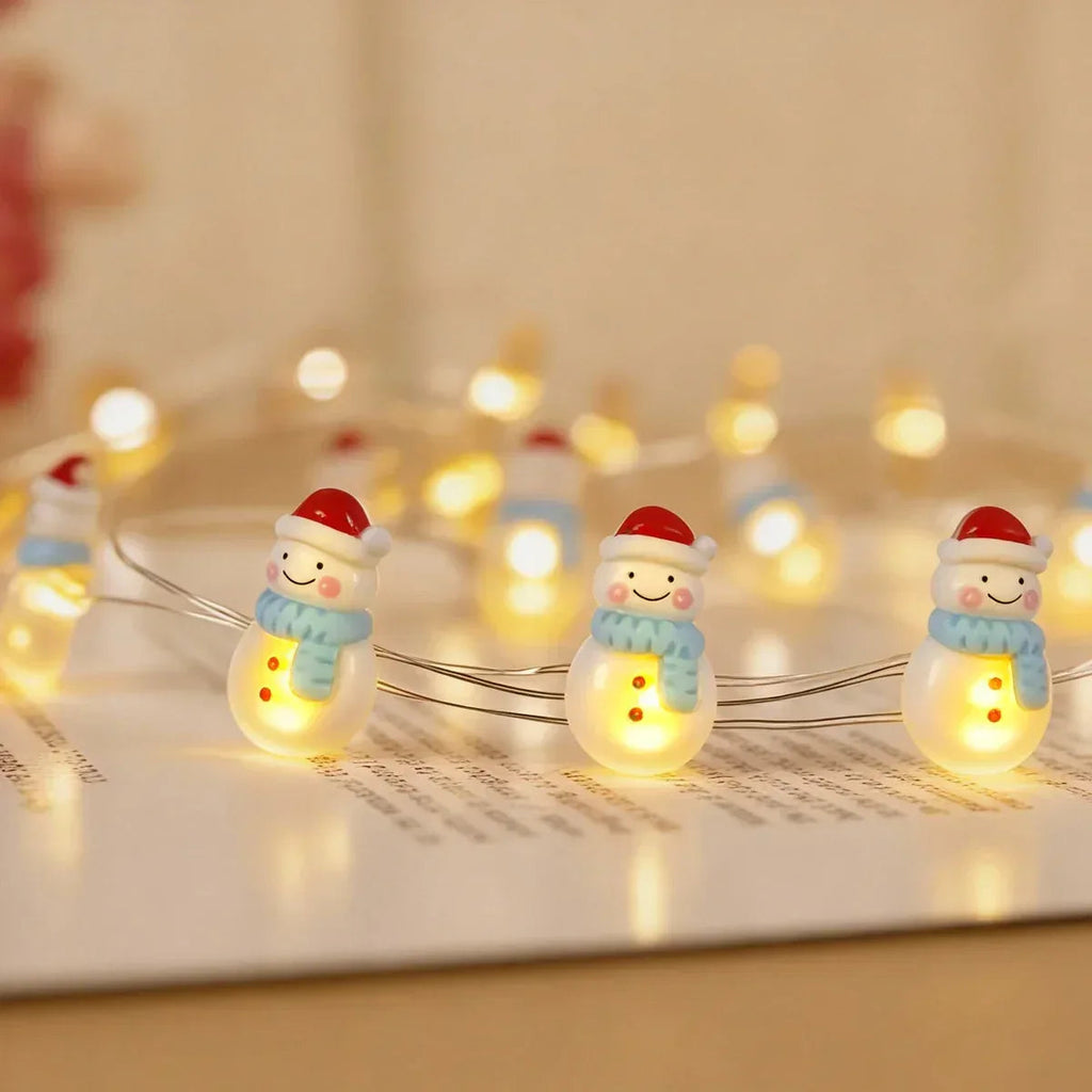 Snowman fairy string lights with warm LEDs for indoor seasonal decor, battery operated, 10 ft, 30 LED