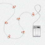Red Scarf Snowman fairy string lights with warm LEDs for indoor seasonal decor, battery operated, 10 ft, 30 LED