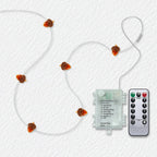 Pinecone fairy string lights with warm LEDs for indoor seasonal decor, battery operated, 10 ft, 30 LED