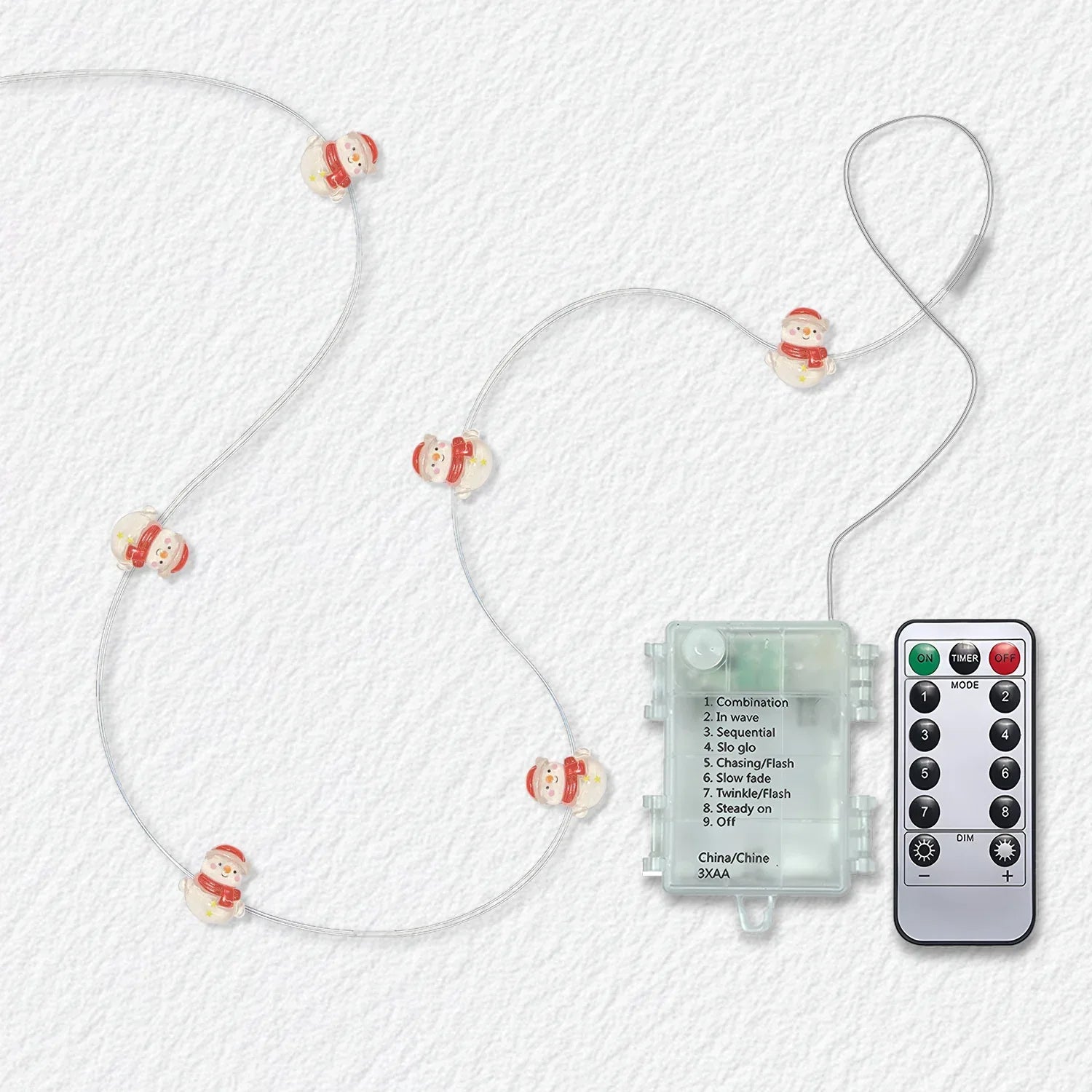 Red Scarf Snowman fairy string lights with warm LEDs for indoor seasonal decor, battery operated, 10 ft, 30 LED