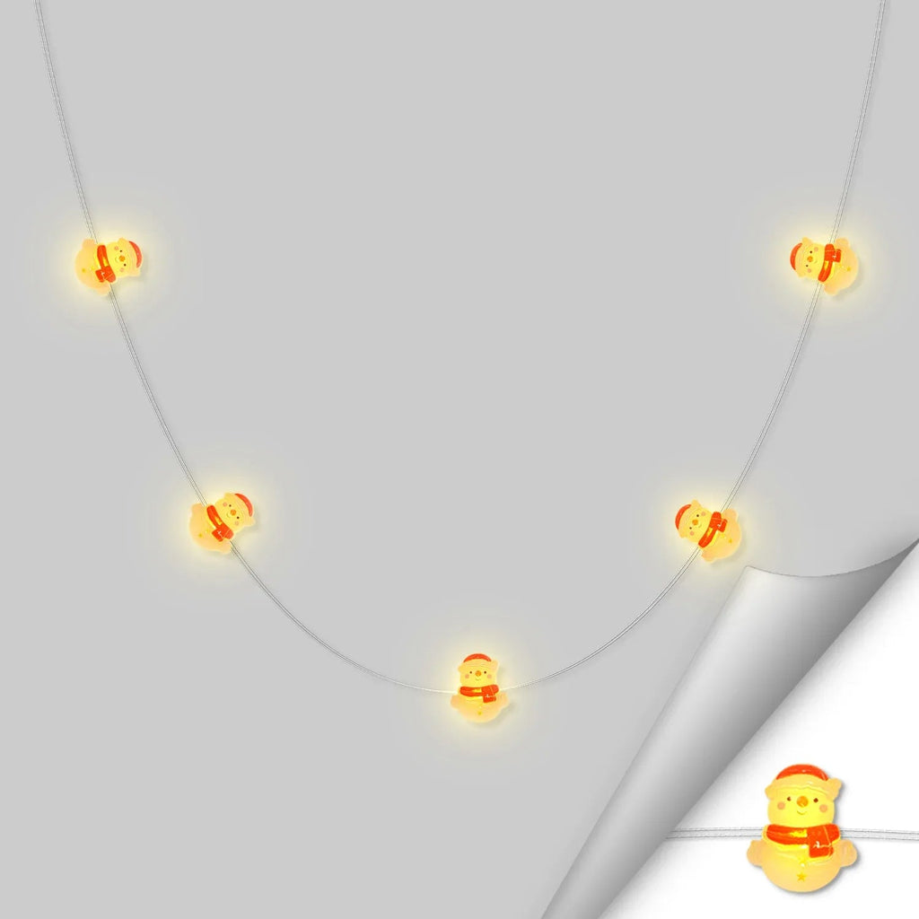 Red Scarf Snowman fairy string lights with warm LEDs for indoor seasonal decor, battery operated, 10 ft, 30 LED